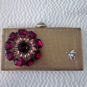 Elegant Gold Clutch with Jewel Embellishments